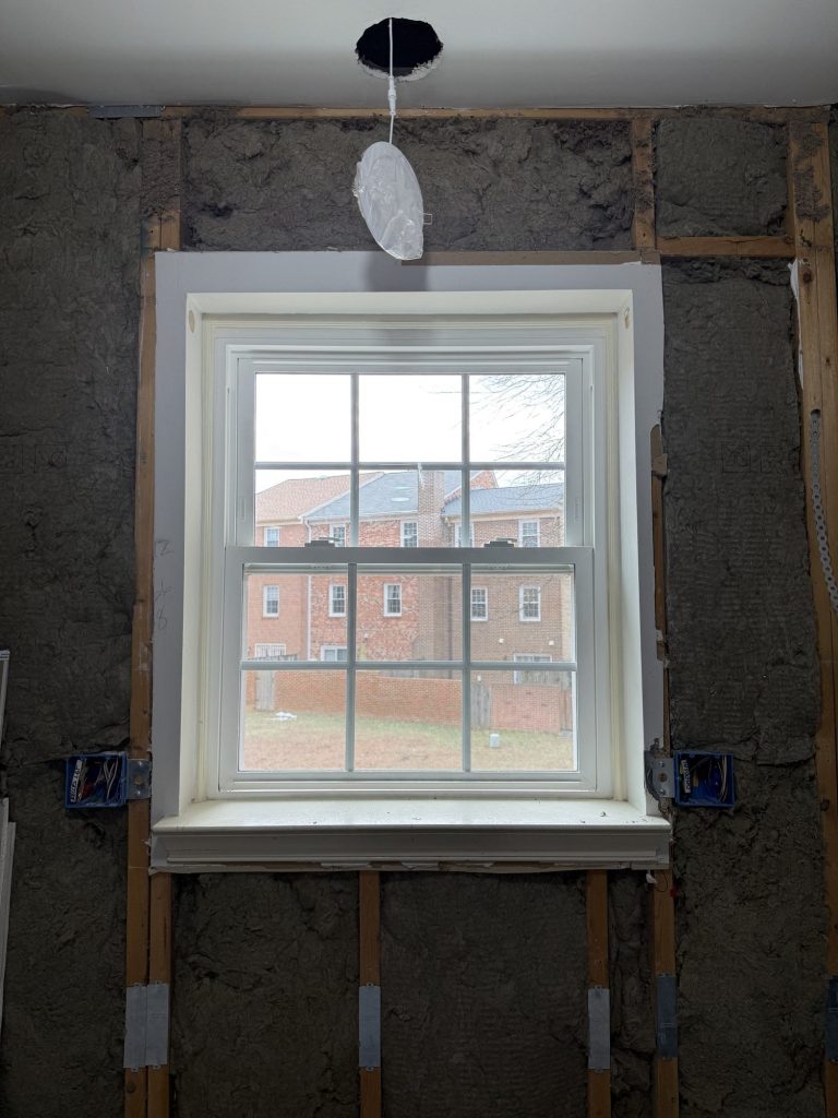 Framed window opening during construction in Alexandria, VA